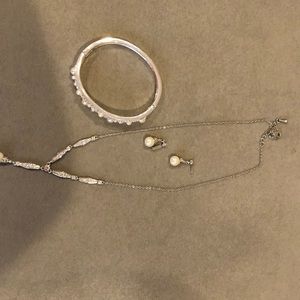 “Pearl” necklace, earrings and bracelet.